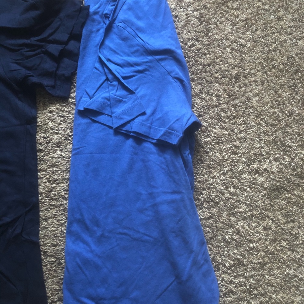 Brand new men’s polo tee shirts.XL